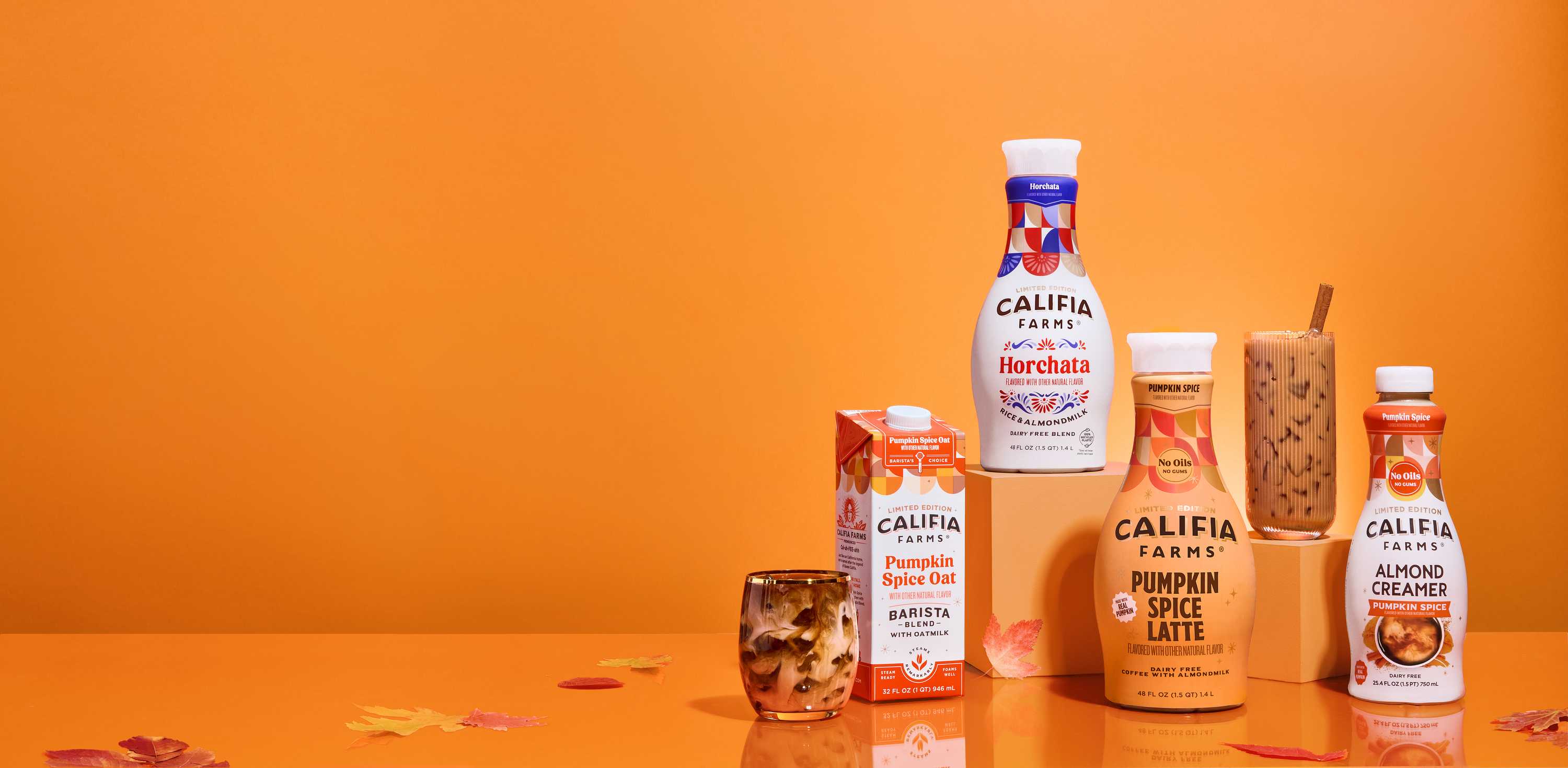 Califia Farms seasonal drinks on an orange campaign backdrop